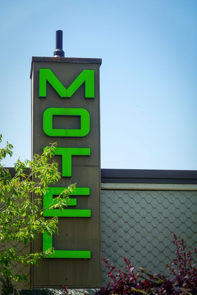 Motel sign against a blue sky