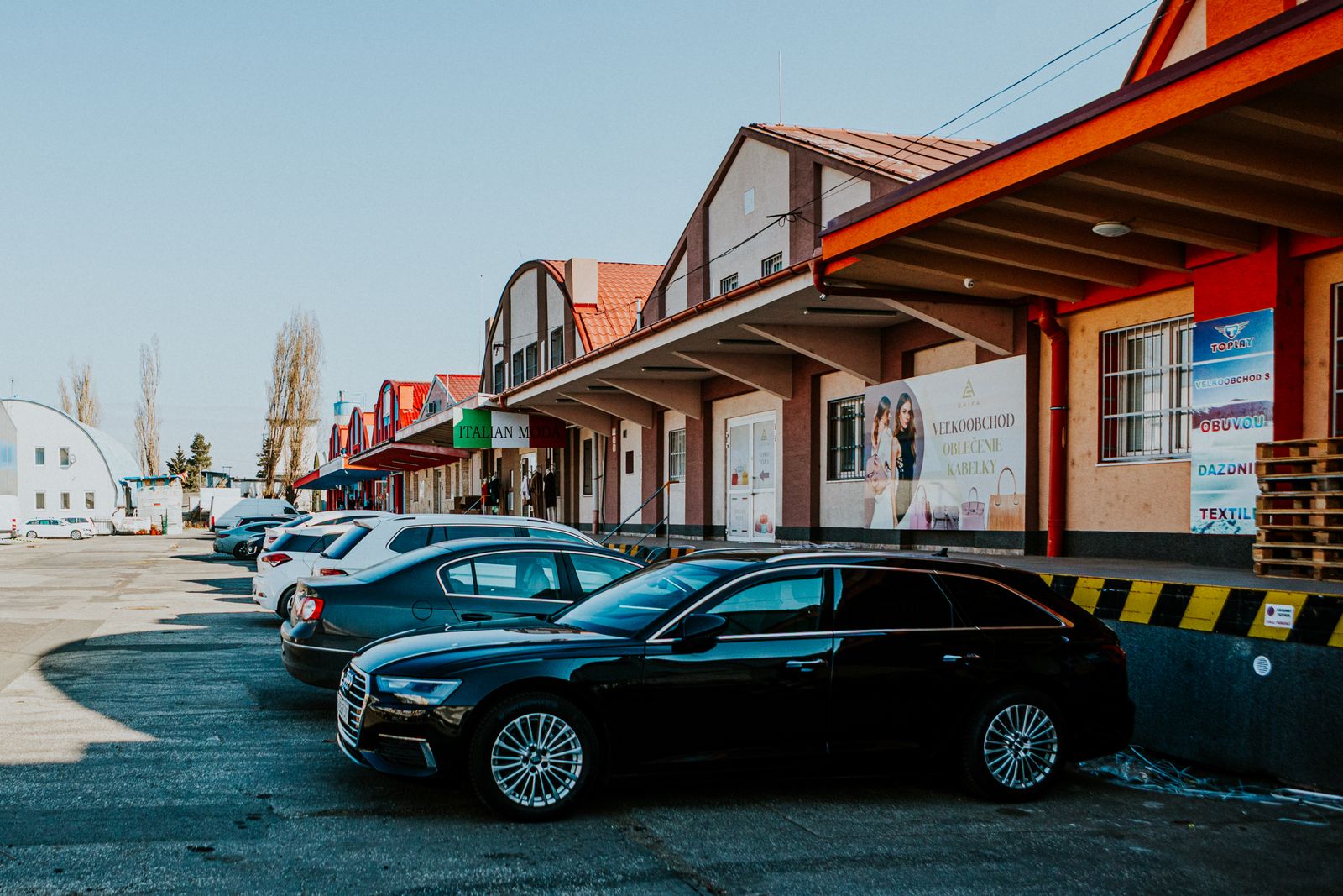 Retail commercial building with parking lot